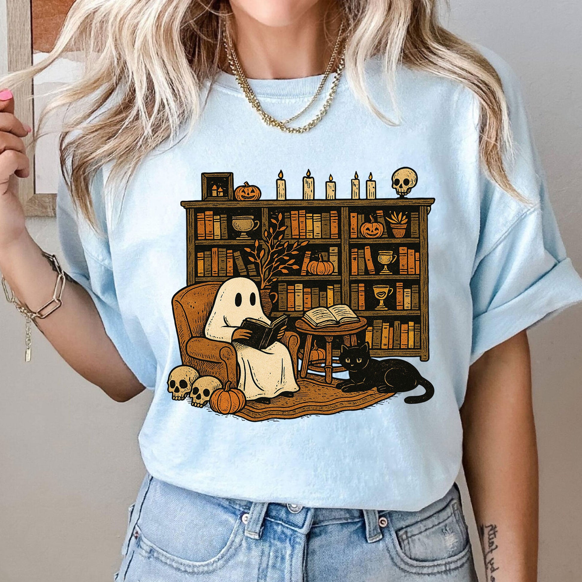 Cozy Halloween Ghost T-Shirt with Bookshelf, Cat, and Pumpkin – Perfect Spooky Fall Outfit for Book Lovers and Autumn Enthusiasts
 - 10