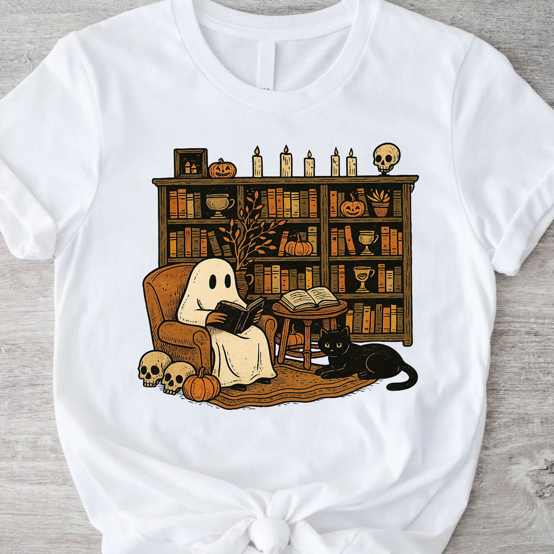 Cozy Halloween Ghost T-Shirt with Bookshelf, Cat, and Pumpkin – Perfect Spooky Fall Outfit for Book Lovers and Autumn Enthusiasts
 - 11
