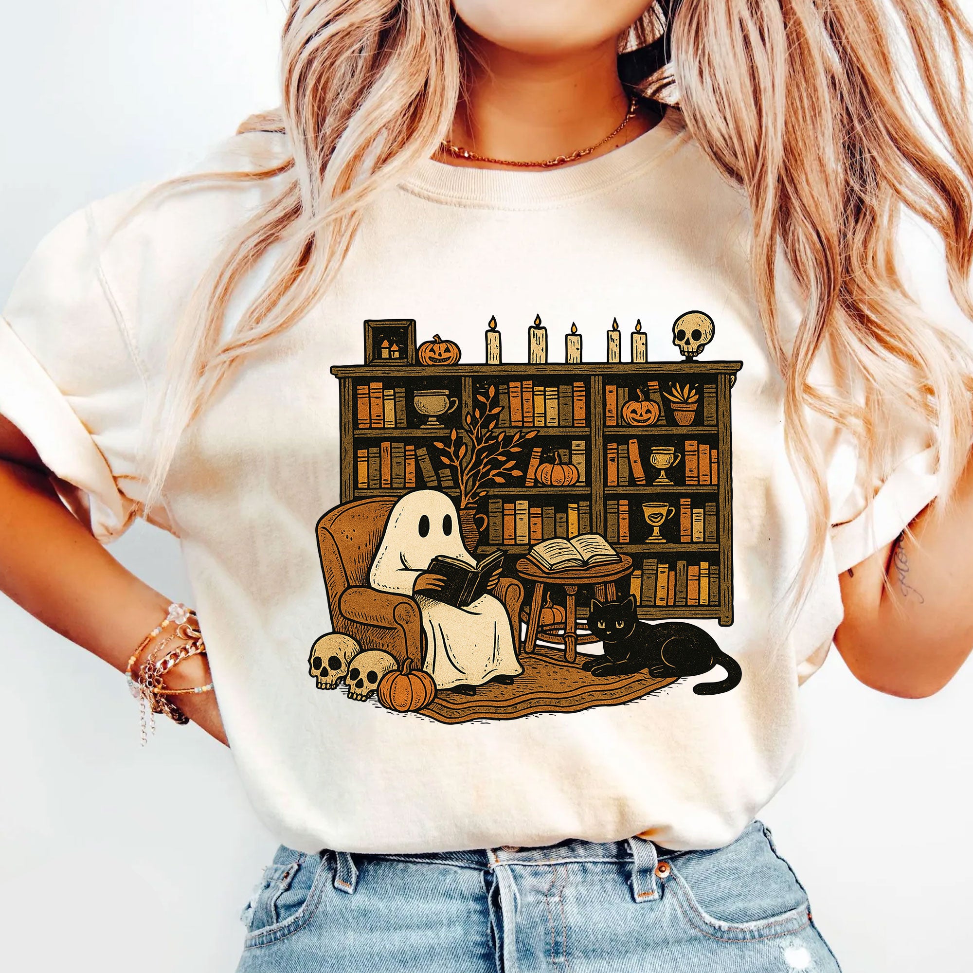 Cozy Halloween Ghost T-Shirt with Bookshelf, Cat, and Pumpkin – Perfect Spooky Fall Outfit for Book Lovers and Autumn Enthusiasts
 - 5
