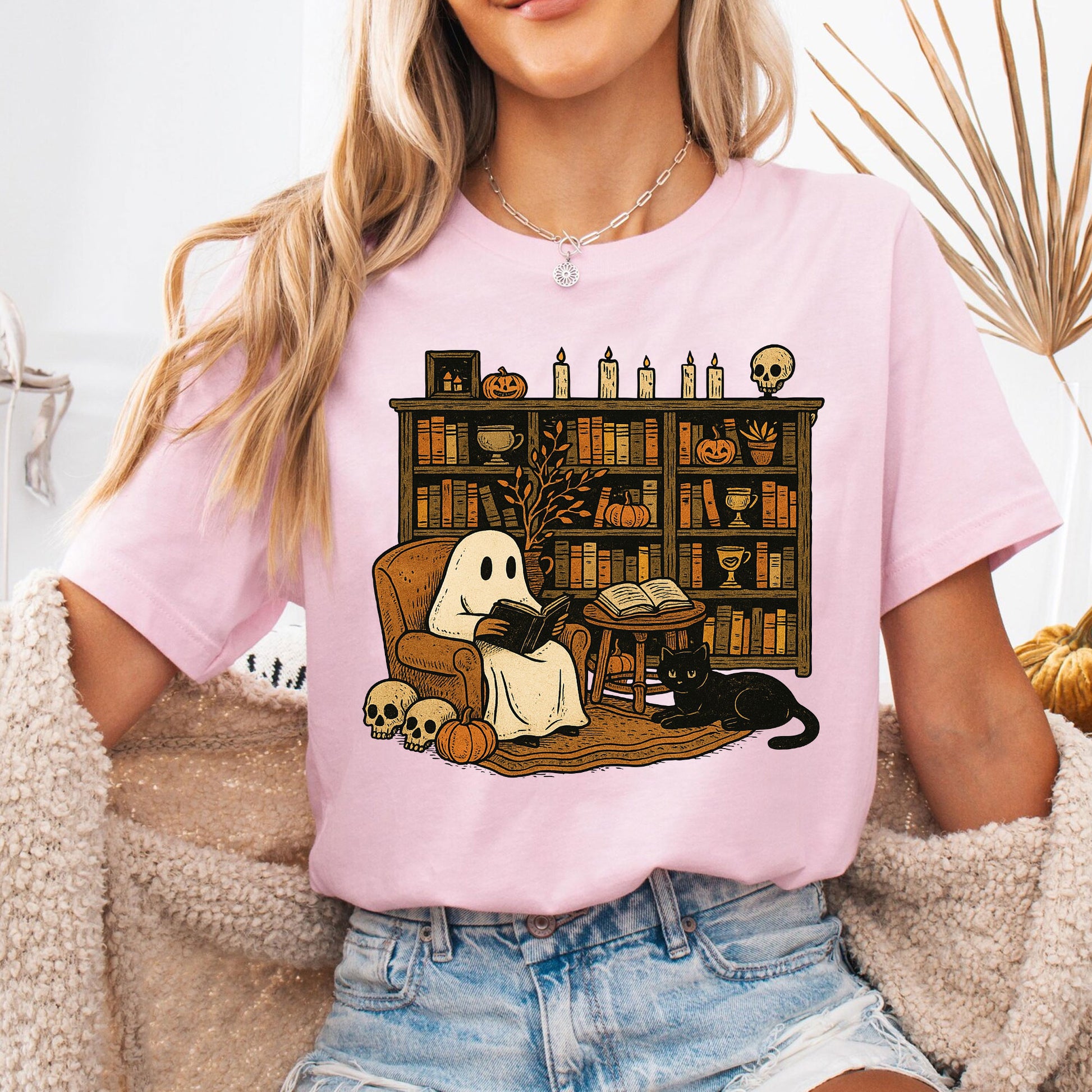 Cozy Halloween Ghost T-Shirt with Bookshelf, Cat, and Pumpkin – Perfect Spooky Fall Outfit for Book Lovers and Autumn Enthusiasts
 - 6