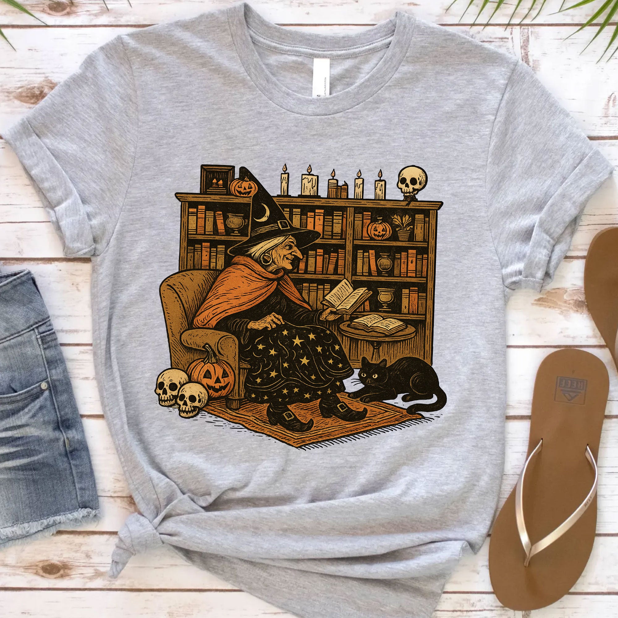 Cozy Halloween Witch Reading T-Shirt with Black Cat and Pumpkin Design – Perfect Spooky Season Gifts for Book Lovers and Cat Enthusiasts
 - 12