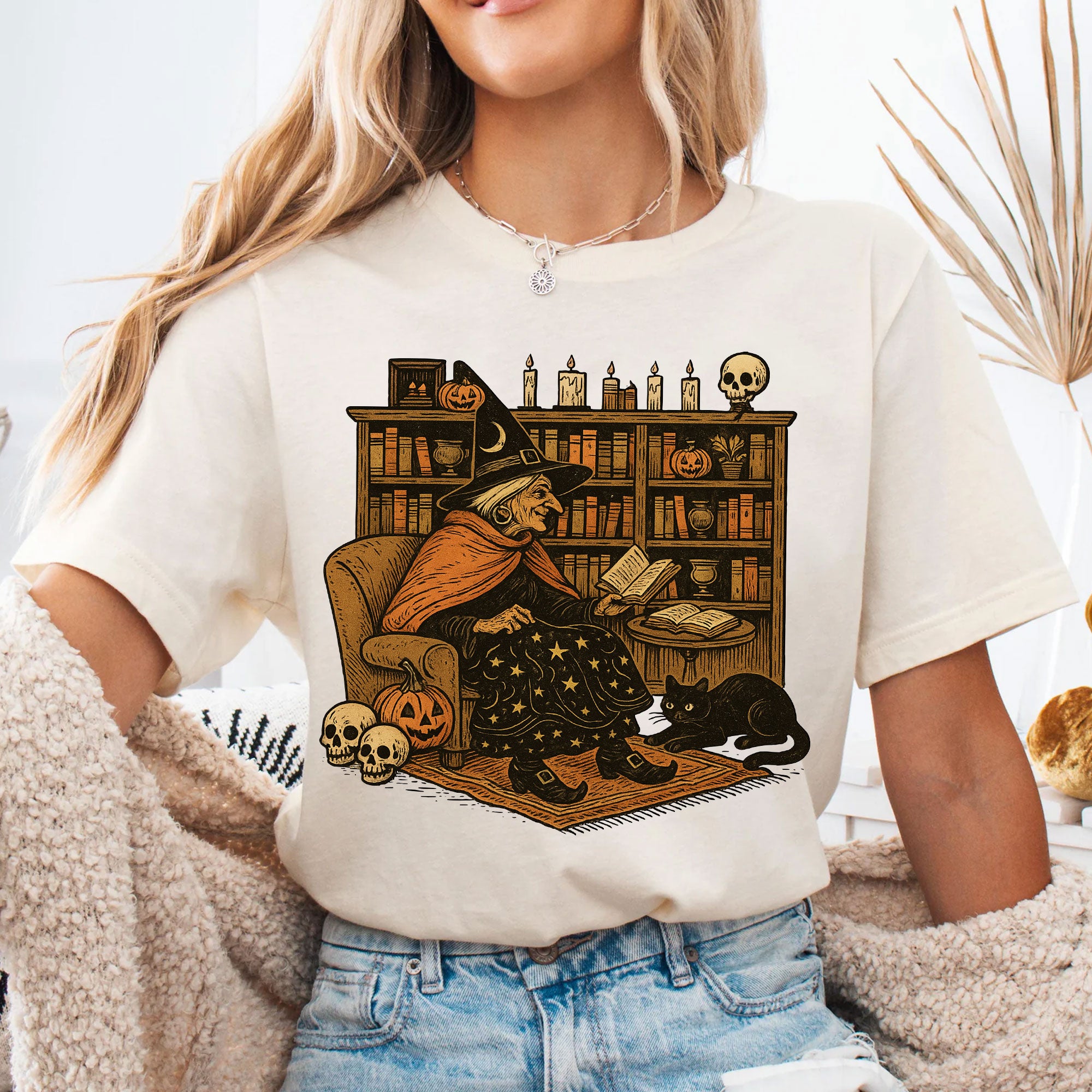 Cozy Halloween Witch Reading T-Shirt with Black Cat and Pumpkin Design – Perfect Spooky Season Gifts for Book Lovers and Cat Enthusiasts
 - 4