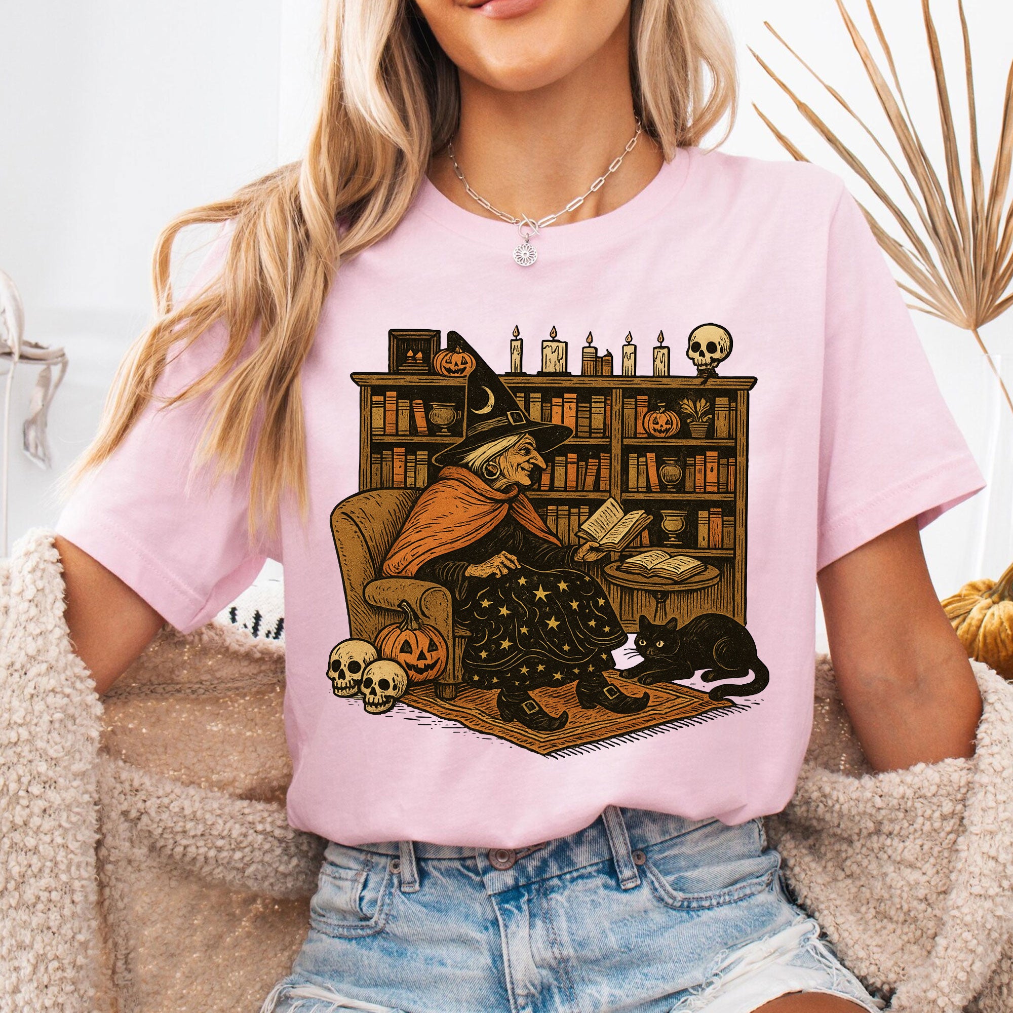 Cozy Halloween Witch Reading T-Shirt with Black Cat and Pumpkin Design – Perfect Spooky Season Gifts for Book Lovers and Cat Enthusiasts
 - 6