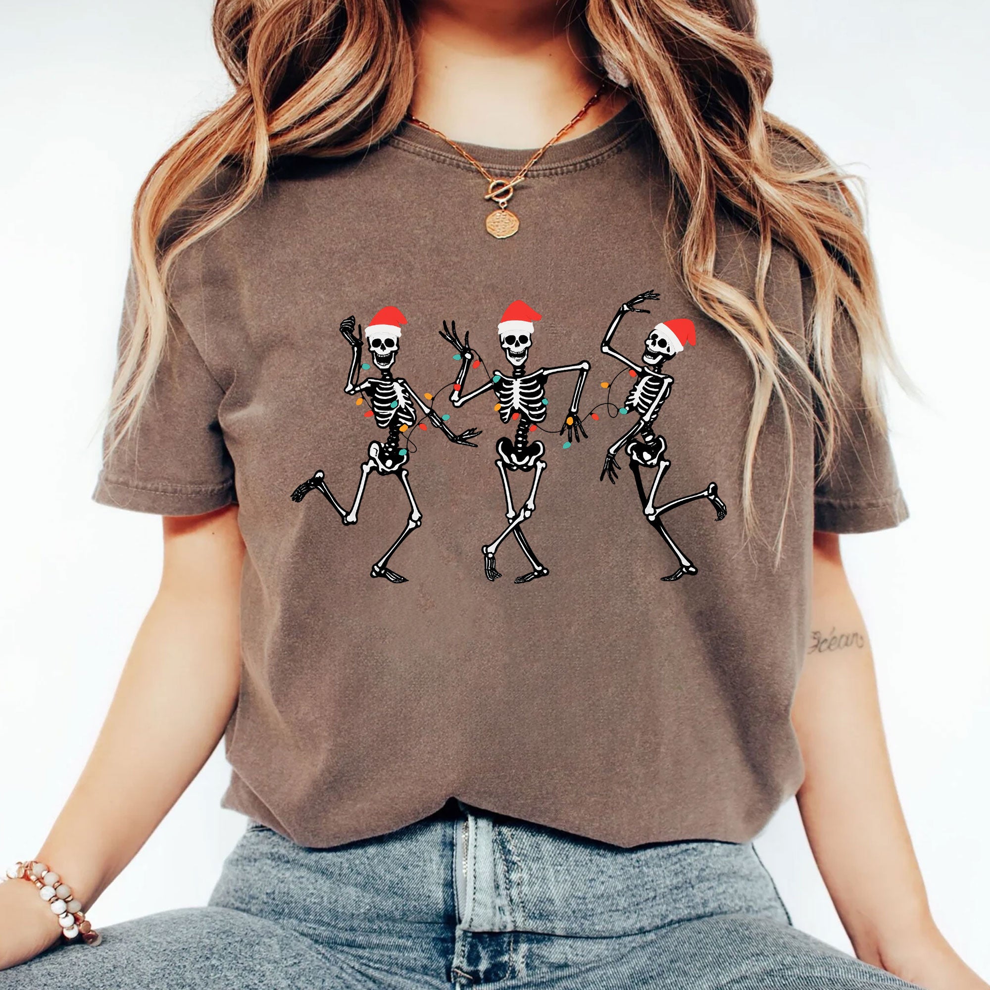 Dancing Skeletons Christmas T-Shirt – Festive Santa Skeletons Graphic Tee – Fun Holiday Apparel for Celebrating Christmas Season
 - 2