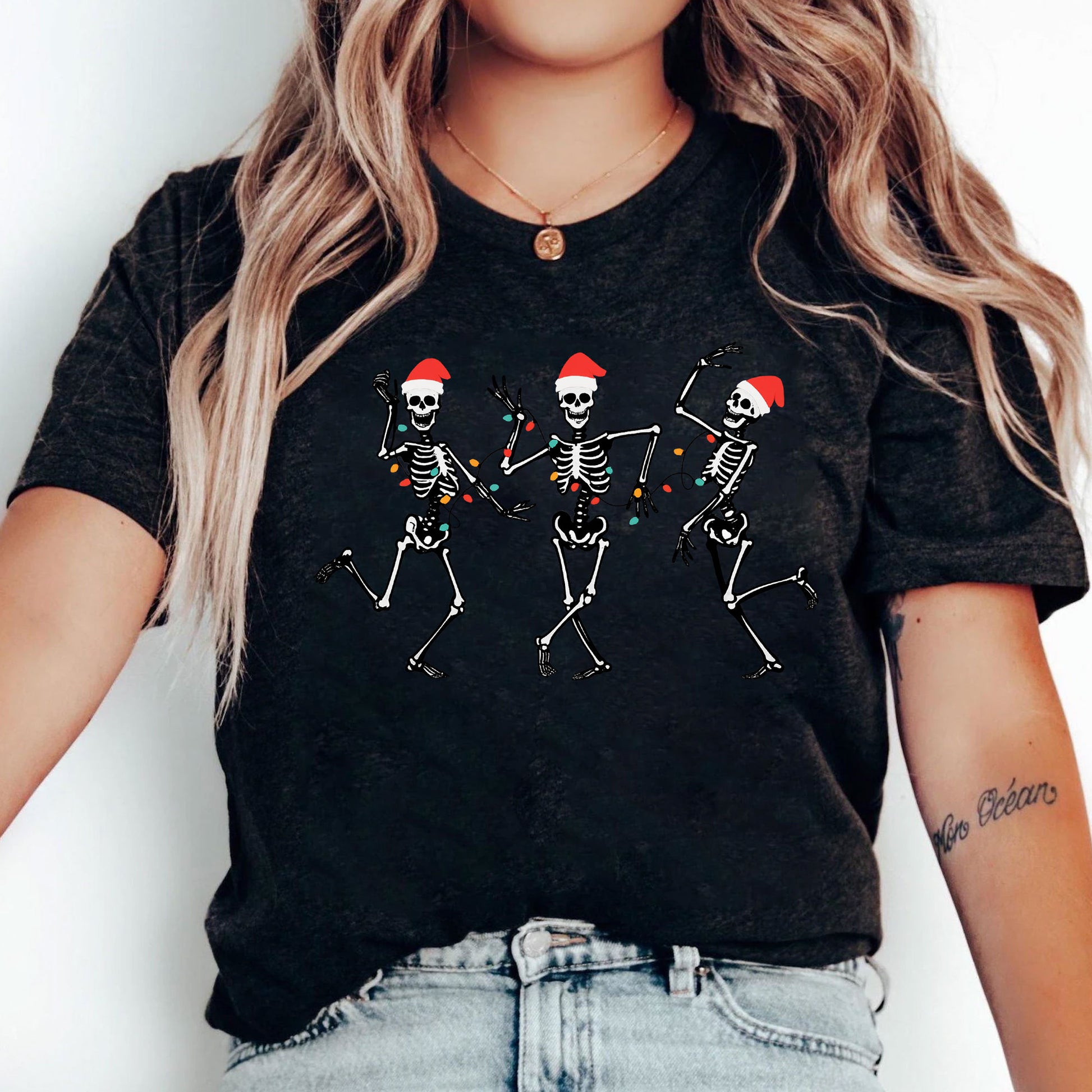 Dancing Skeletons Christmas T-Shirt – Festive Santa Skeletons Graphic Tee – Fun Holiday Apparel for Celebrating Christmas Season
 - 5