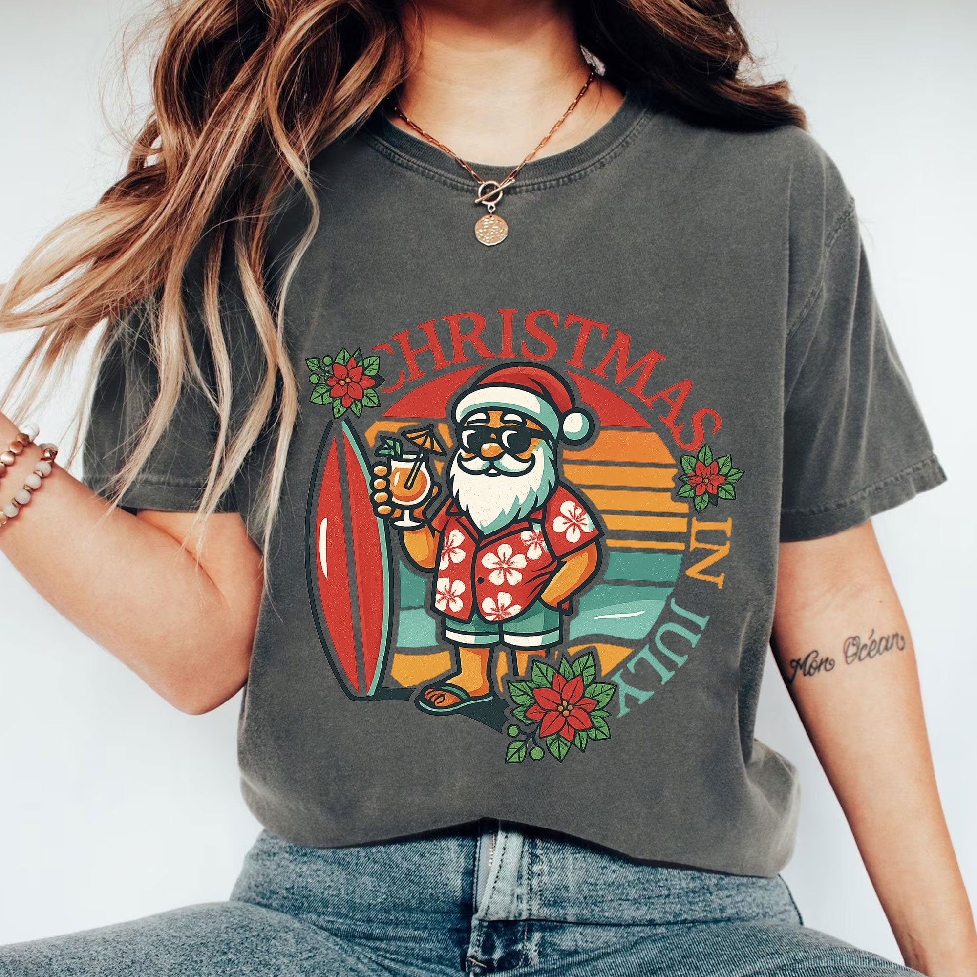 Festive Christmas in July Graphic Tee - Surfer Santa Design, Fun Holiday Style, Perfect for Summer Celebrations, Unisex Fit
 - 1