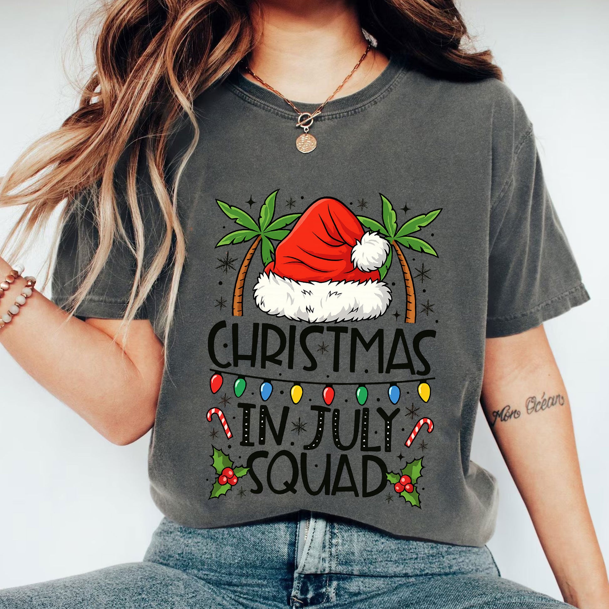Festive 'Christmas in July Squad' T-Shirt with Santa Hat and Palm Trees - Perfect Holiday Celebration Tee for Summer Fun
 - 1