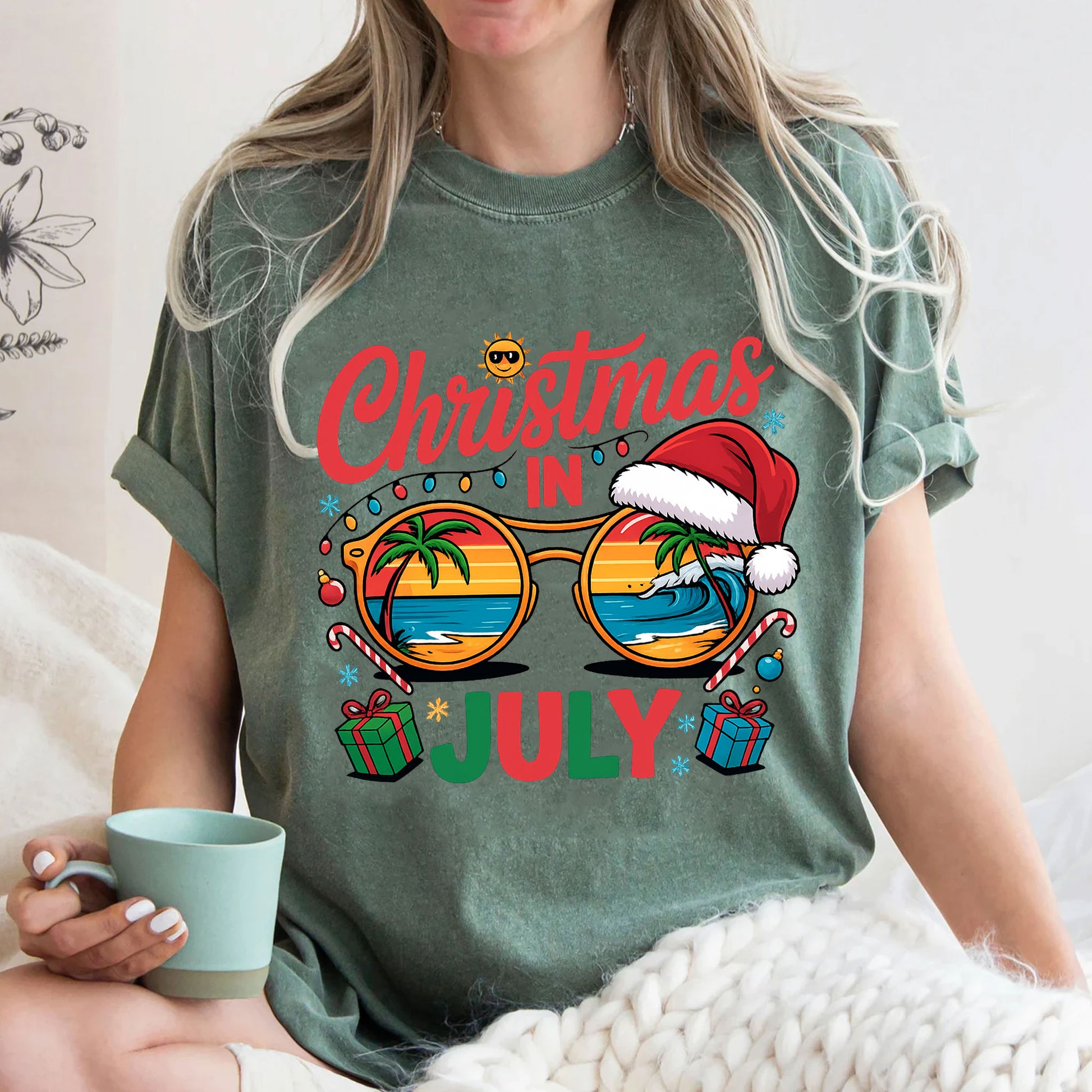 Festive Christmas in July Women's T-Shirt: Fun Holiday Graphic Tee Featuring Beach Scene, Sunglasses, and Santa Hat Design
 - 3