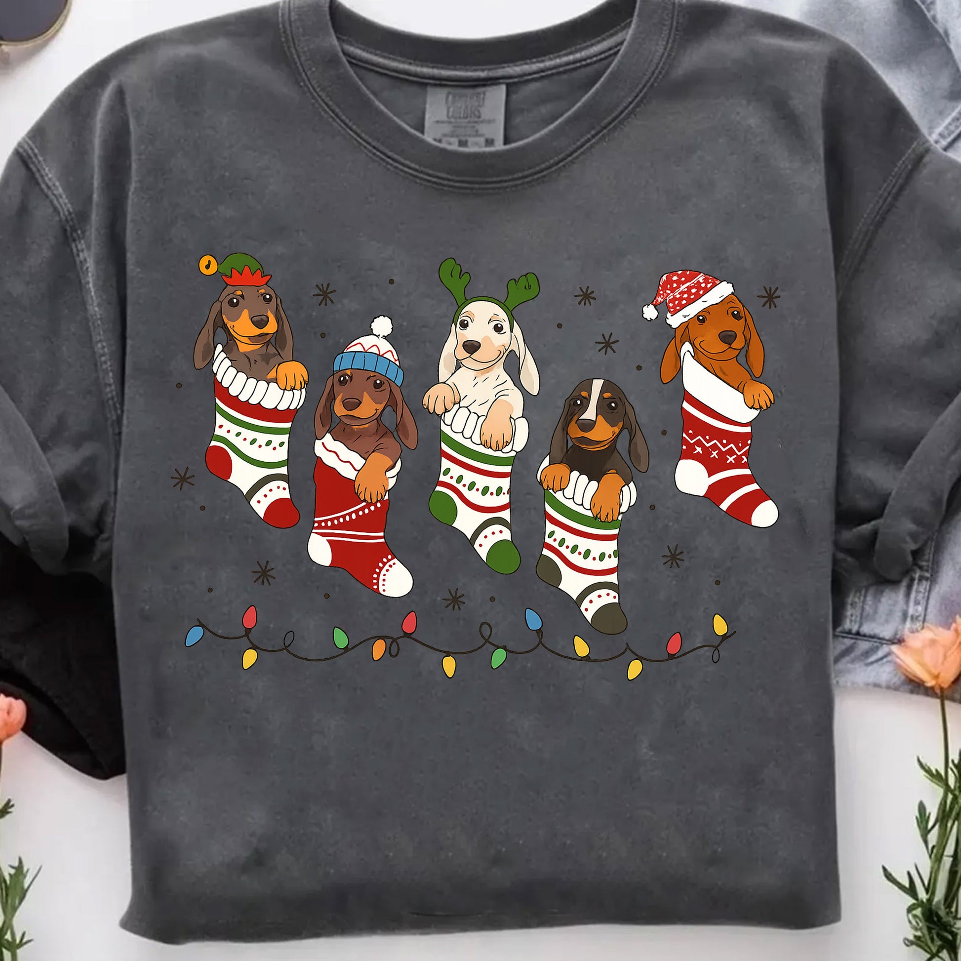 Festive Dachshund Christmas Stocking Shirt - Cute Holiday Dog Lover Graphic Tee with Colorful Lights and Cozy Puppies Design
 - 7