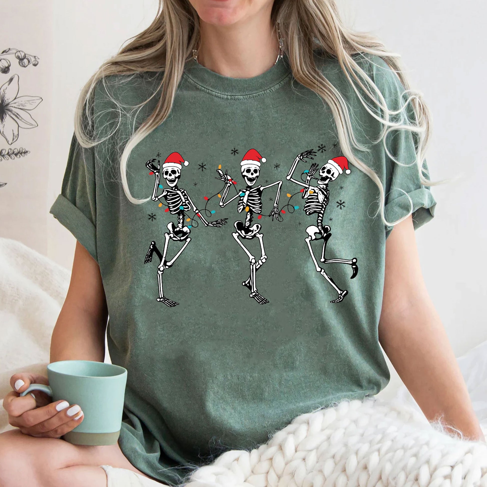 Festive Dancing Skeletons Christmas T-Shirt – Funny Holiday Skeleton Graphic Tee with Santa Hats for Women – Unique Christmas Apparel
 - 3