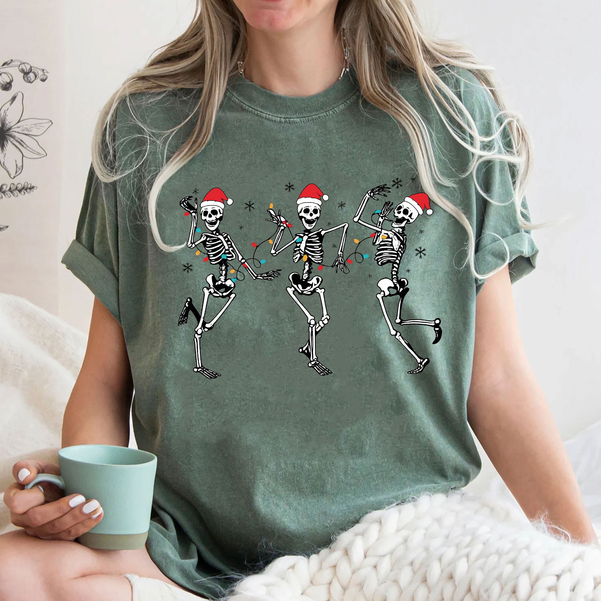 Festive Dancing Skeletons Christmas T-Shirt – Funny Holiday Skeleton Graphic Tee with Santa Hats for Women – Unique Christmas Apparel
 - 3