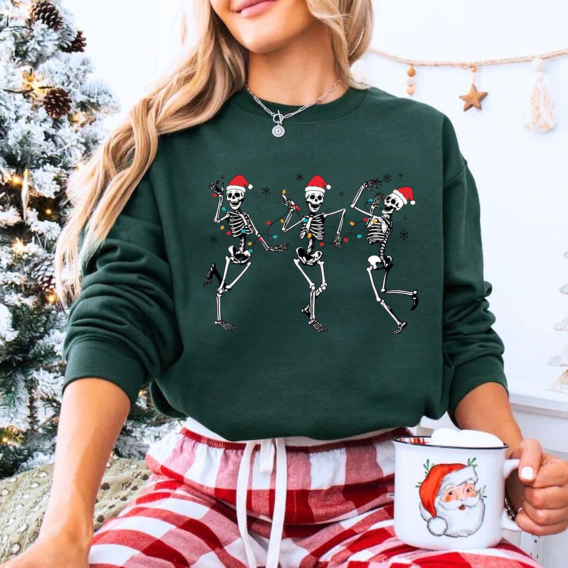 Festive Dancing Skeletons Christmas T-Shirt – Funny Holiday Skeleton Graphic Tee with Santa Hats for Women – Unique Christmas Apparel
 - 8