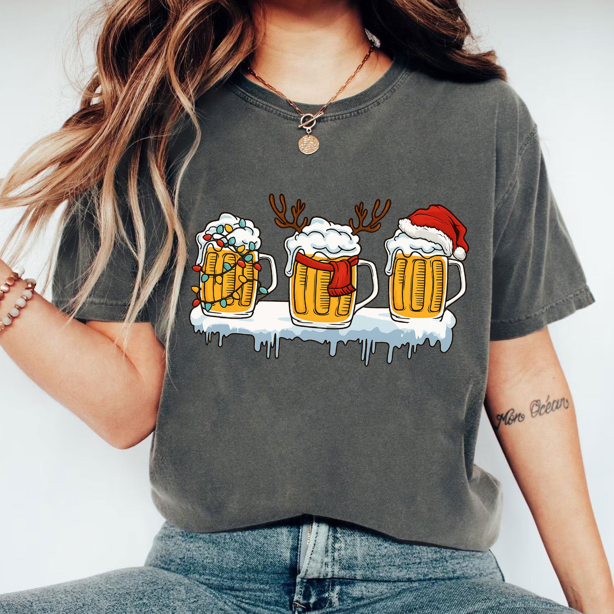 Festive Holiday Beer Mug Graphic Tee - Fun Christmas Shirt with Santa Hat, Reindeer, and Lights - Perfect for Holiday Celebrations
 - 1