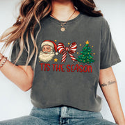 Festive Santa and Christmas Tree Graphic Tee - Perfect Holiday Season Gift for Women - Celebrate Style with Tis the Season Shirt
 - 1