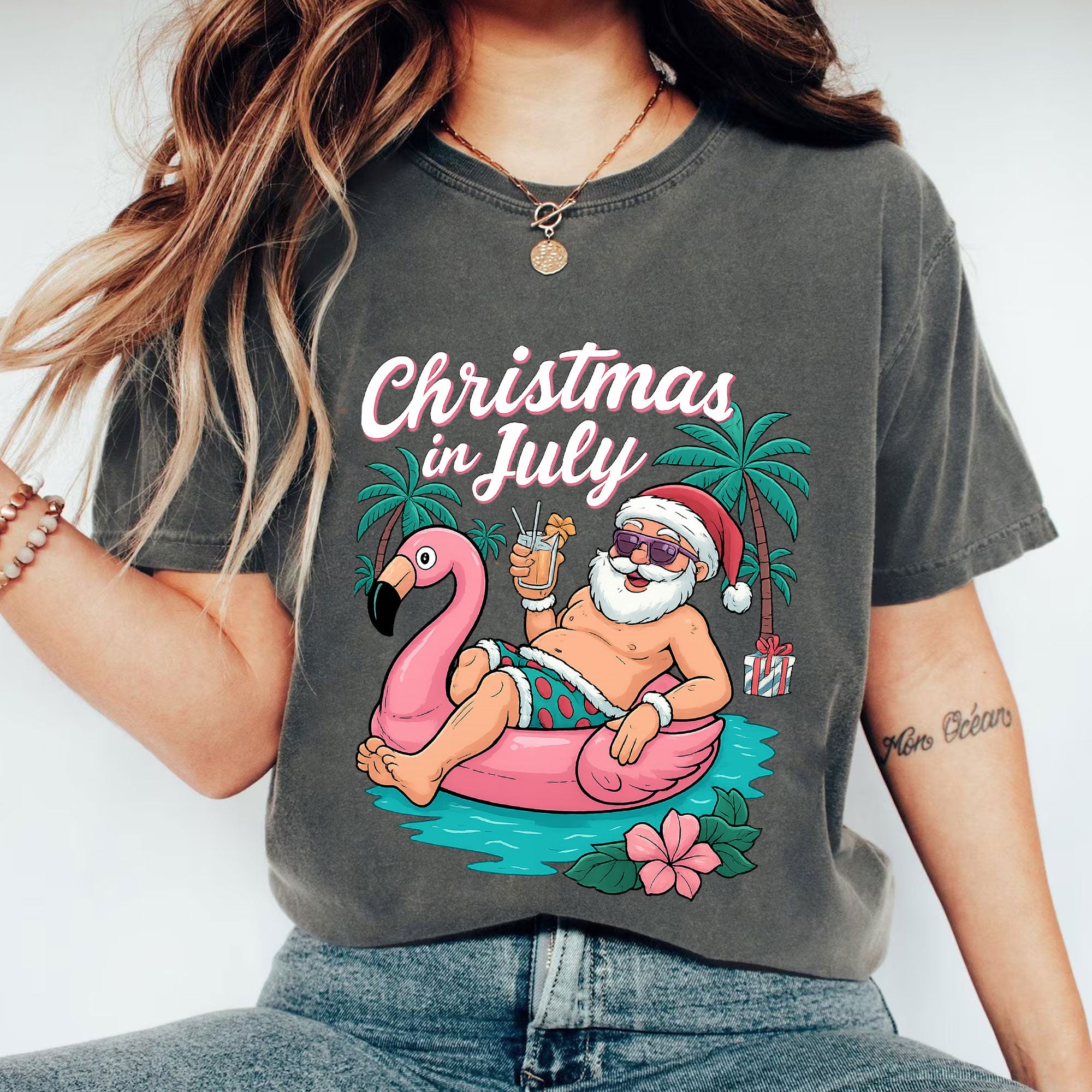 Fun Christmas in July T-Shirt - Santa on Flamingo Float Graphic Tee for Summer Holiday Vibes - Perfect Beach Party Outfit
 - 1
