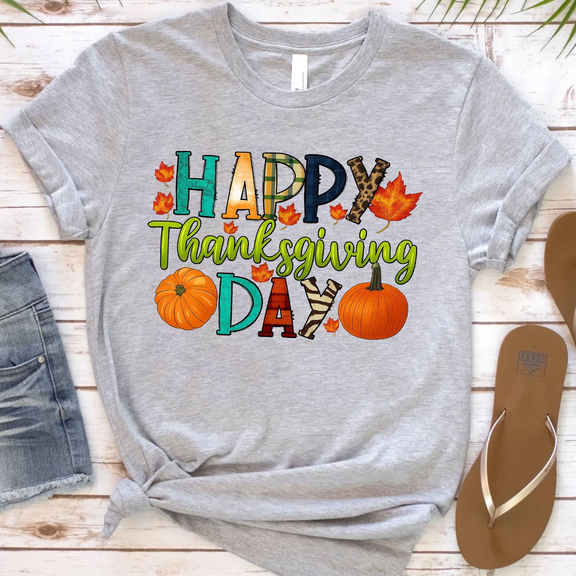 Happy Thanksgiving Shirt with Colorful Leaves and Pumpkins – Perfect for Fall Celebrations and Family Gatherings – Women's Casual Tee
 - 12