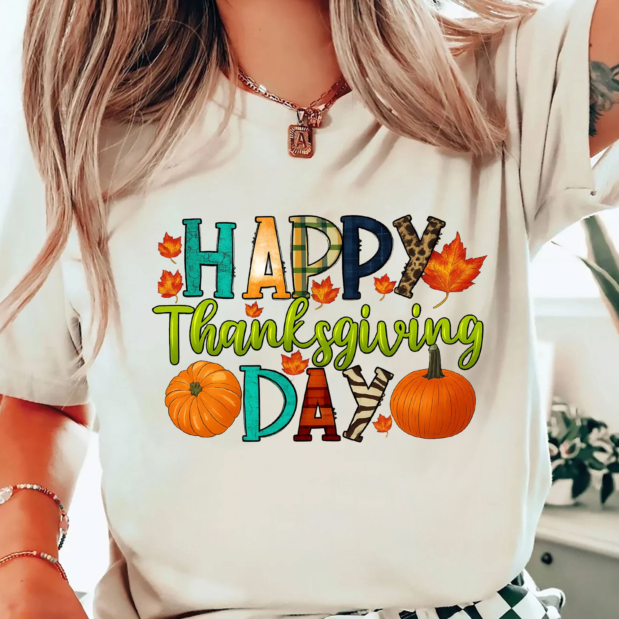 Happy Thanksgiving Shirt with Colorful Leaves and Pumpkins – Perfect for Fall Celebrations and Family Gatherings – Women's Casual Tee
 - 2