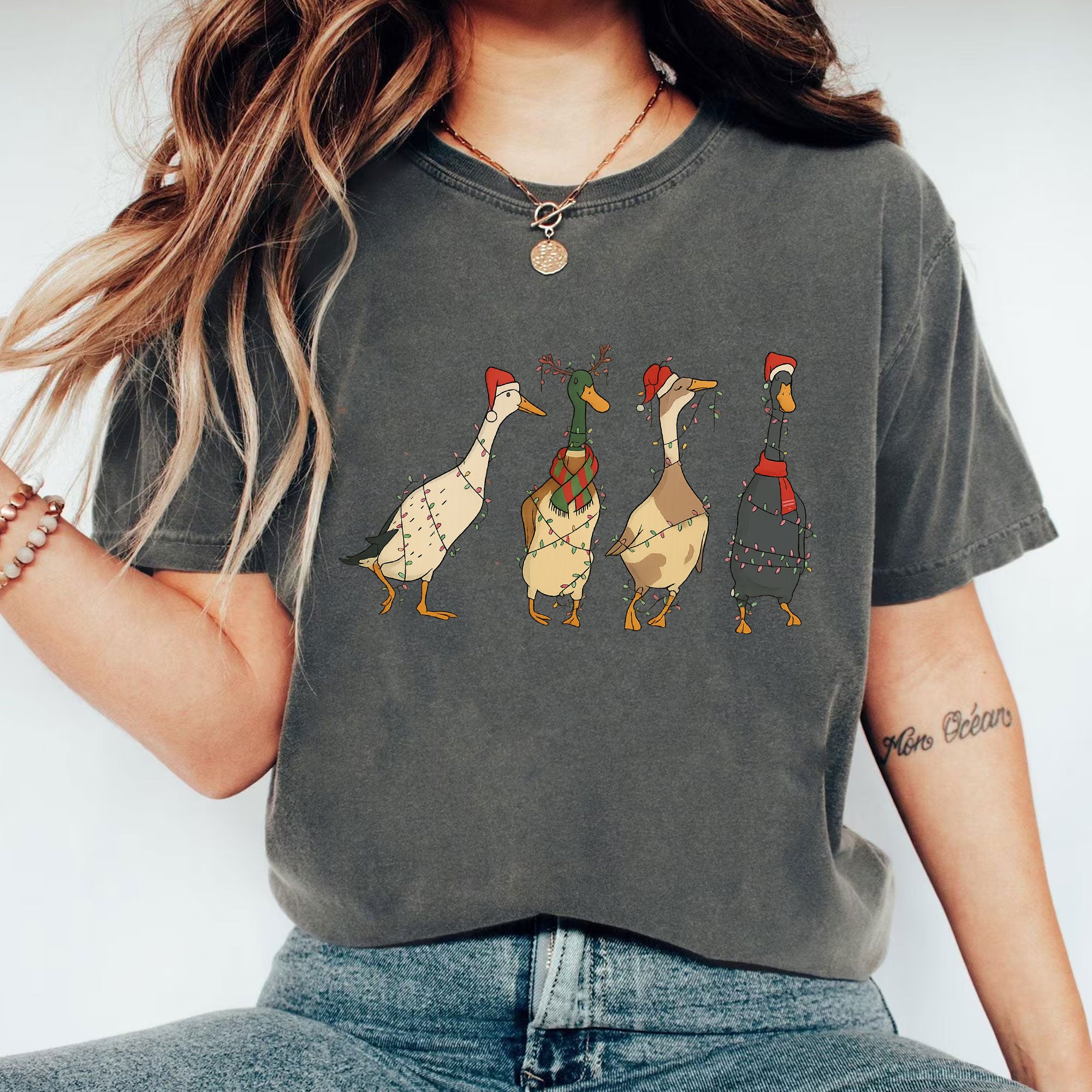 Quirky Christmas Duck T-Shirt for Women - Festive Holiday Design with Santa Hats and Lights - Fun Seasonal Tee for Gifting
 - 1