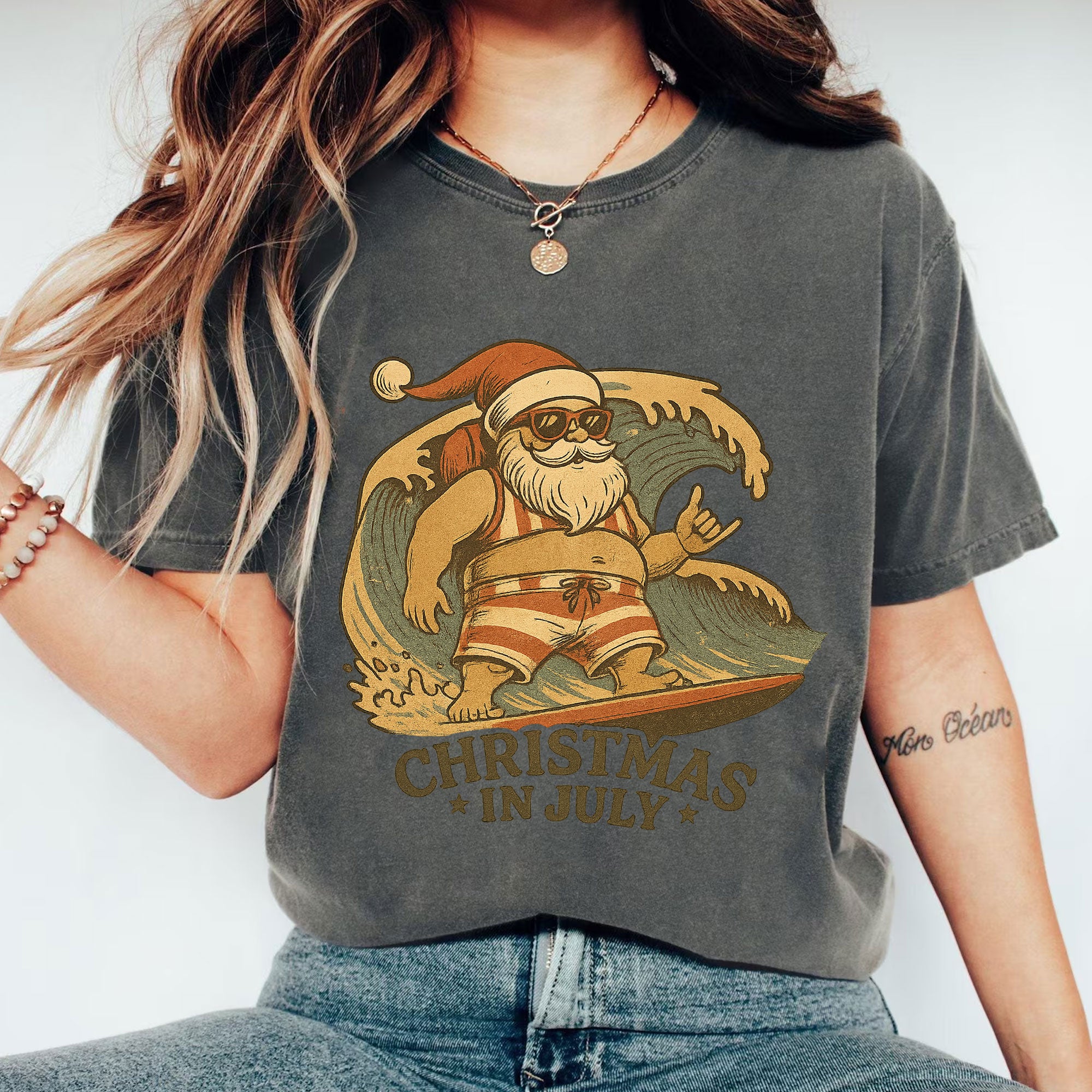 Surfing Santa Graphic T-Shirt - Fun Christmas in July Theme - Trendy Summer Holiday Tee with Cool Retro Design for Beach Lovers
 - 1