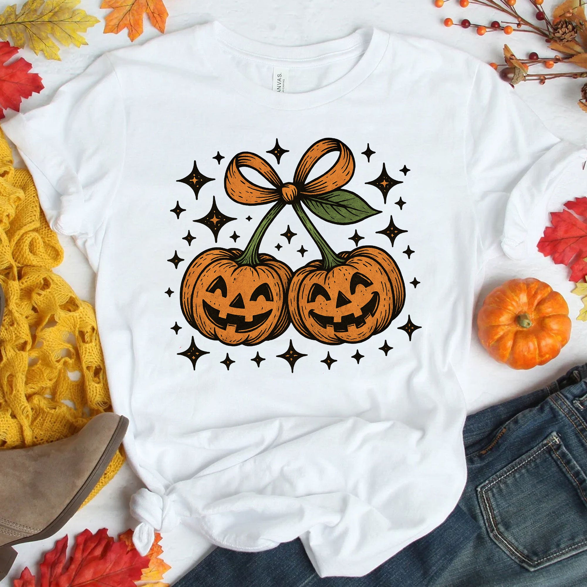 Trendy Halloween Pumpkin Graphic Tee - Spooky Vintage Jack-O'-Lanterns with Bow Design, Perfect for Festive Autumn Celebrations
 - 1