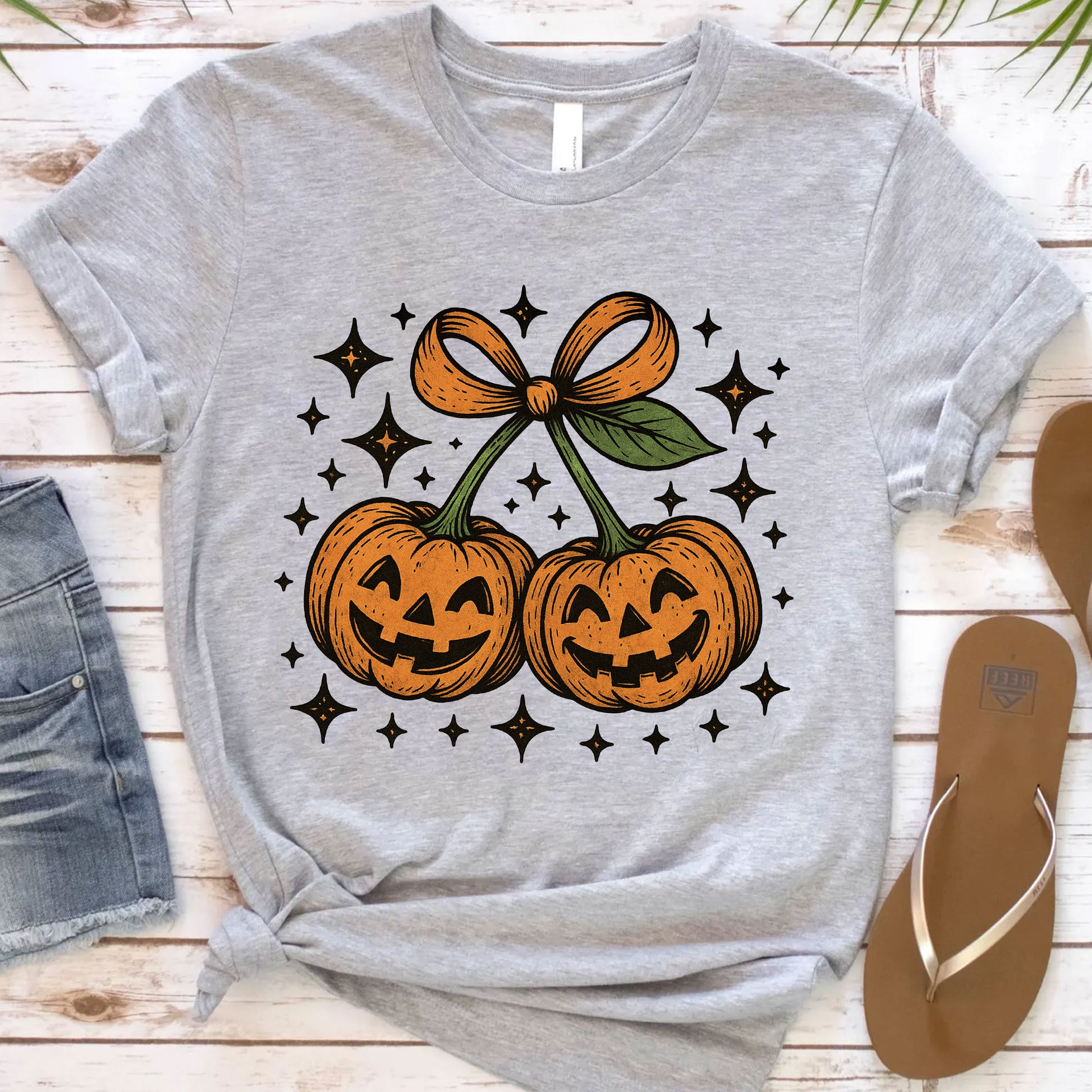 Trendy Halloween Pumpkin Graphic Tee - Spooky Vintage Jack-O'-Lanterns with Bow Design, Perfect for Festive Autumn Celebrations
 - 12