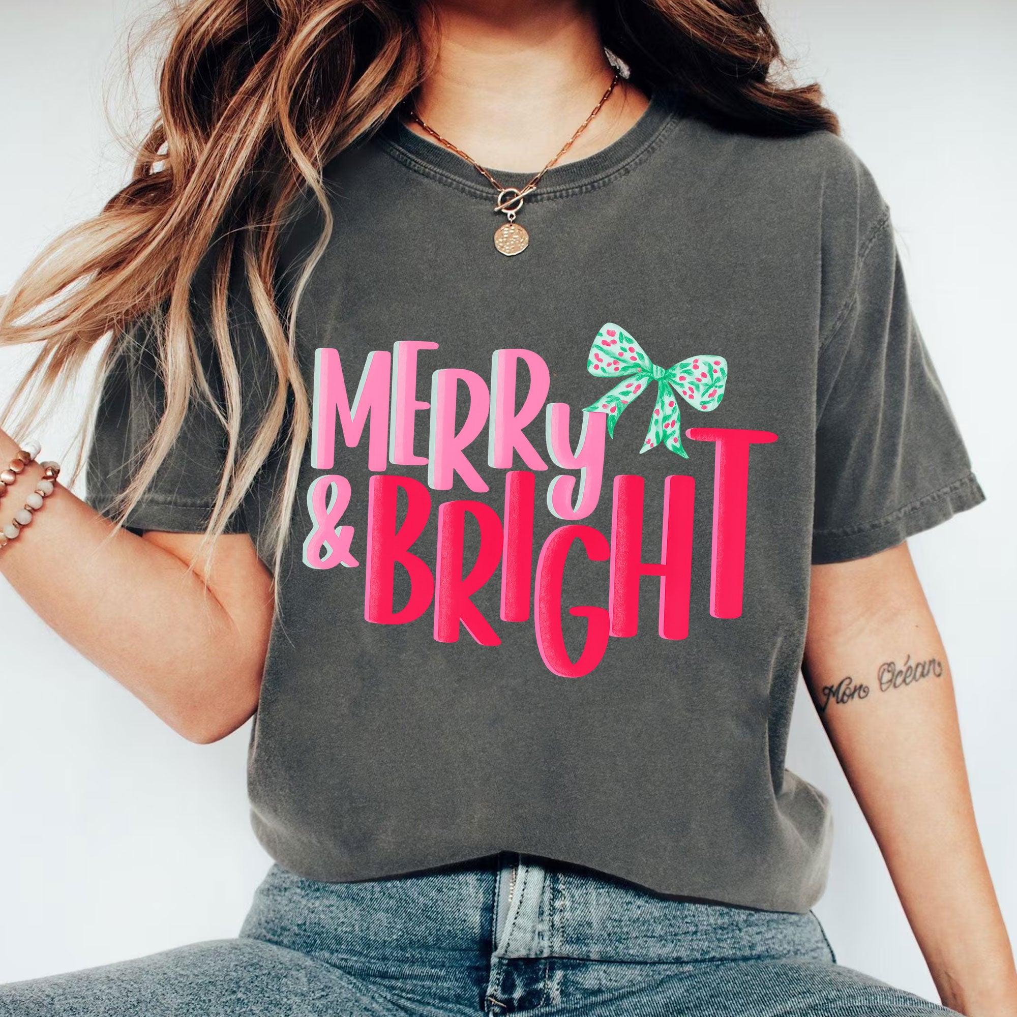Trendy Merry & Bright Christmas Graphic Tee for Women – Festive Holiday T-Shirt with Colorful Bow Design | Perfect Gift Idea
 - 1