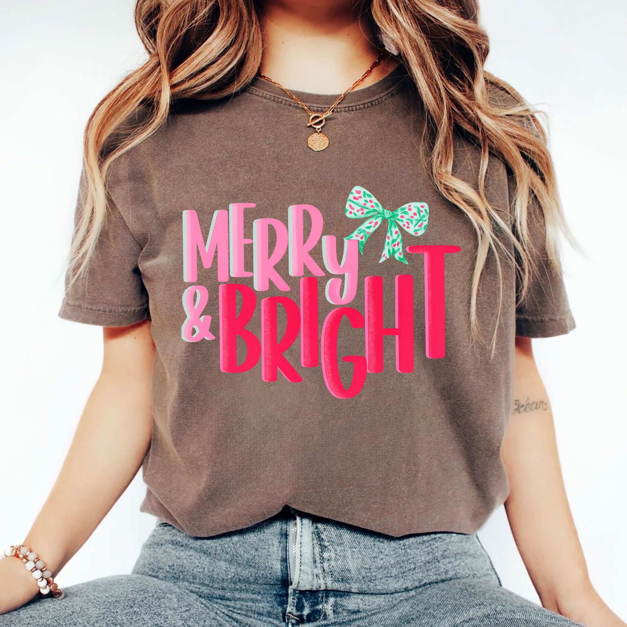 Trendy Merry & Bright Christmas Graphic Tee for Women – Festive Holiday T-Shirt with Colorful Bow Design | Perfect Gift Idea
 - 2